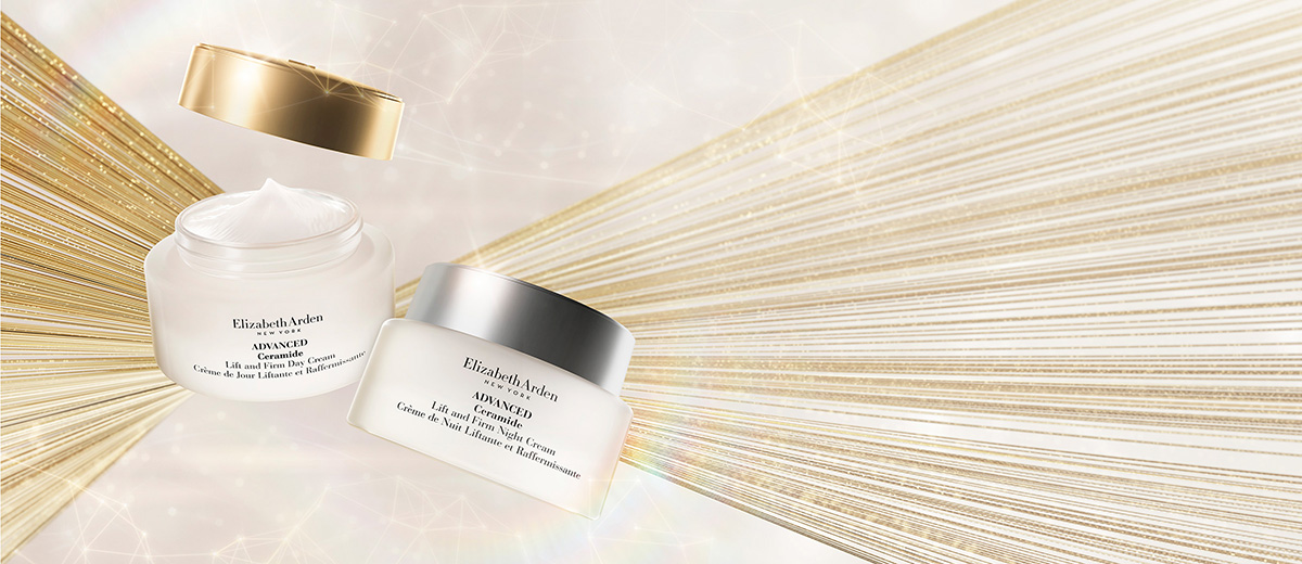 2 Advanced Ceramide lift and firm moisturizers floating over a gold sparkling background